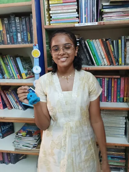 Another happy reader who conquered our reading challenge! Her smile says it all. These challenges are all about building consistent reading habits in a fun, motivating way.