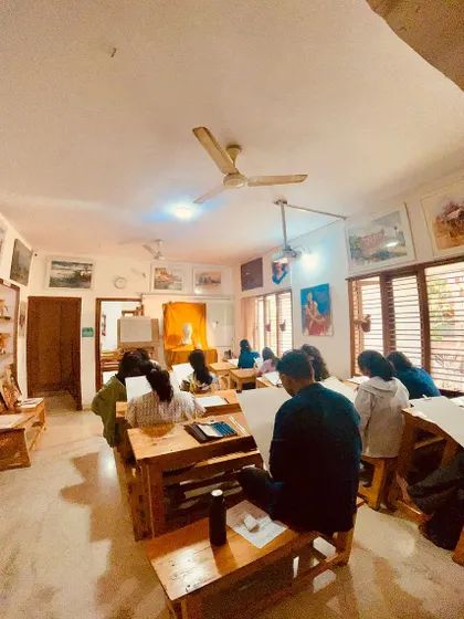 A wide-angle view of our classroom during exams for the Diploma in Fine Arts. The space is designed for focus, with students fully engaged in demonstrating the skills they have developed.