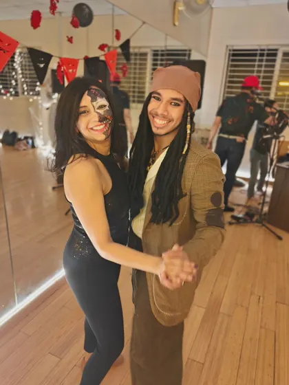 Jack Sparrow finding his dance partner at our Halloween social. It was a night of spook-tacular fun.