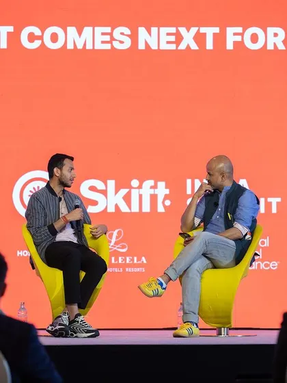 A one on one fireside chat at the Skift India Summit. I position myself to capture both the speakers and the on-screen branding for maximum impact.