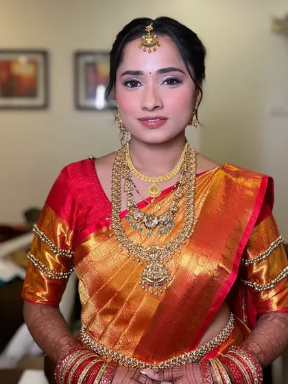 My beautiful South Indian bride, looking absolutely radiant for her wedding rituals. I focused on creating a dewy, luminous complexion that enhances her natural glow.