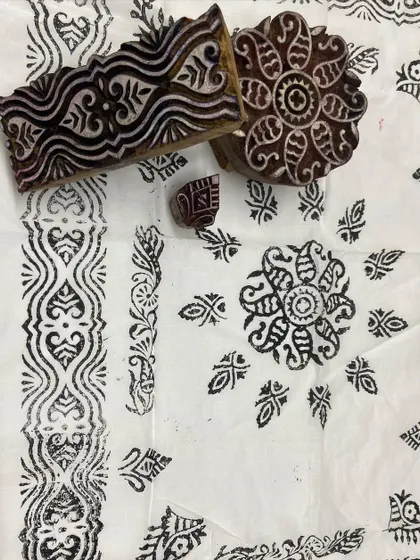 A composition of different block prints on one fabric, showing how to combine various motifs.