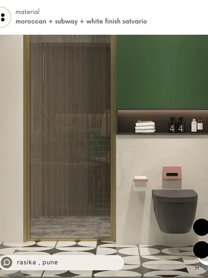A bathroom design for Rasika in Pune, combining Moroccan floor tiles, subway wall tiles, and a solid green accent wall for a unique and eclectic look.
