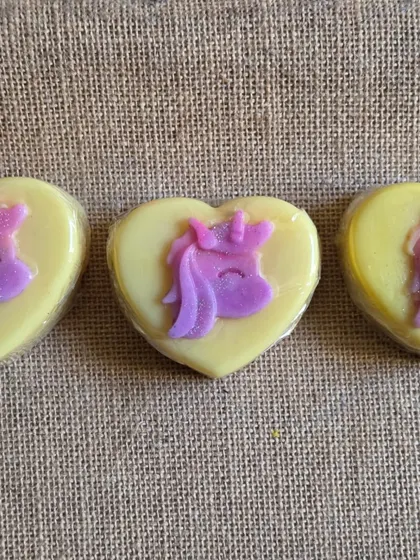 A cute, heart-shaped soap with a unicorn inside. These are individually wrapped and perfect as small party favors.