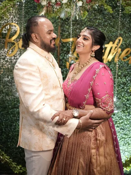 Another shot of the lovely couple, celebrating their special day in our custom designs.