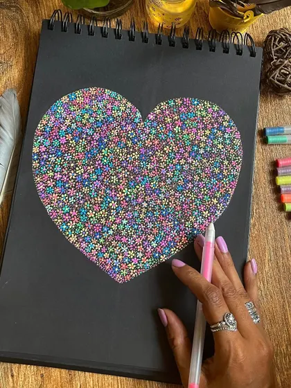 A heart filled with a thousand tiny flowers, a piece I created for Valentine's Day. You always gain by giving love.