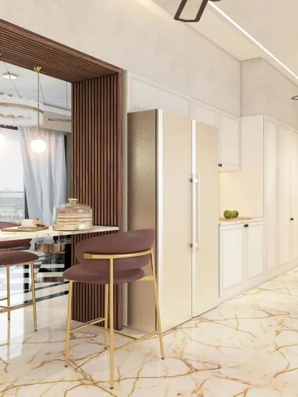 A view of the kitchen and utility area, showing the seamless integration of appliances like the washing machine into the cabinetry.