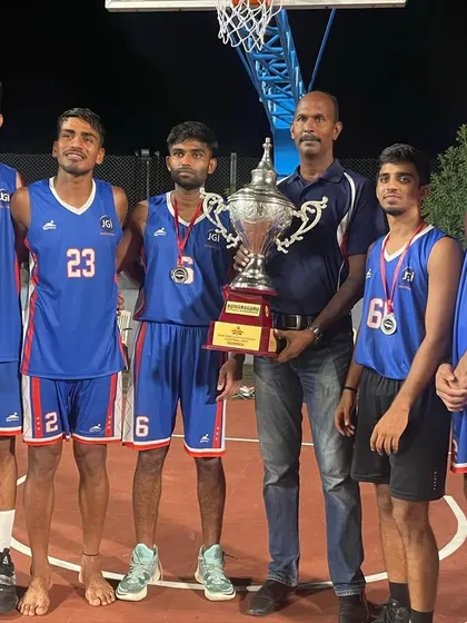 With my coach and teammates, holding the runner-up trophy.