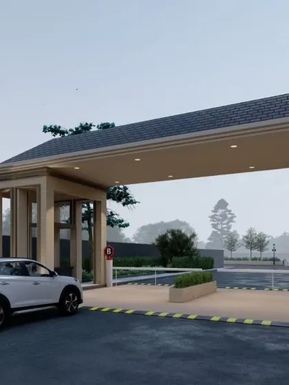 This is the gateway to an exclusive gated community of bungalows we designed in Raipur. The grand architectural features and meticulously landscaped surroundings of the entrance are crafted to captivate and invite residents into a world of sophistication.