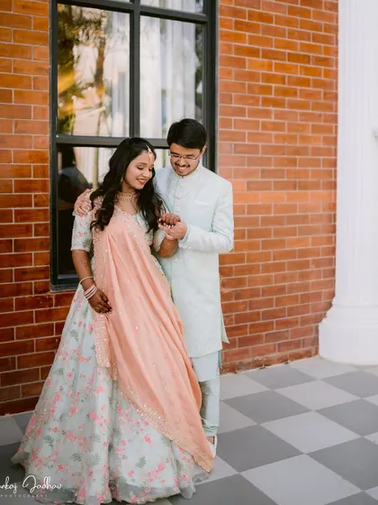 A sweet moment between Shriya and Soham at their pastel-themed engagement.