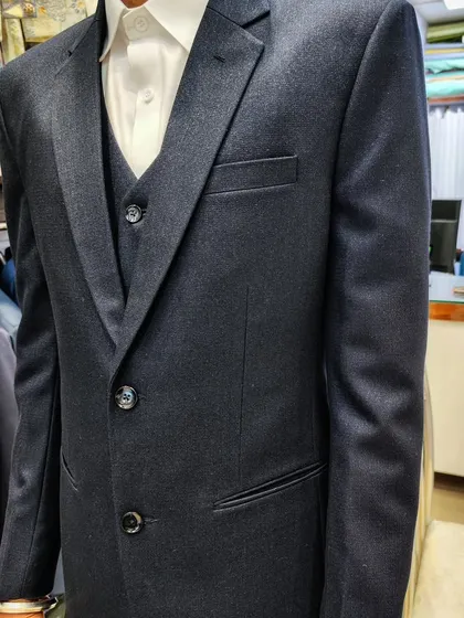 A collection of our clients in their custom-tailored formal suits, showcasing different fabrics and fits for various professional and formal occasions.