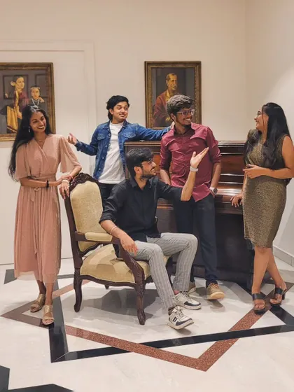 The band having a laugh during a photoshoot.