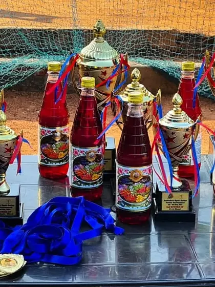 The trophies, medals, and refreshments ready for our tournament's closing ceremony. We make sure to celebrate the hard work of all participants.