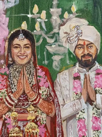 A close-up of the couple from the Orana Conventions painting. Their happy expressions and traditional 'namaste' pose create a warm and welcoming portrait.