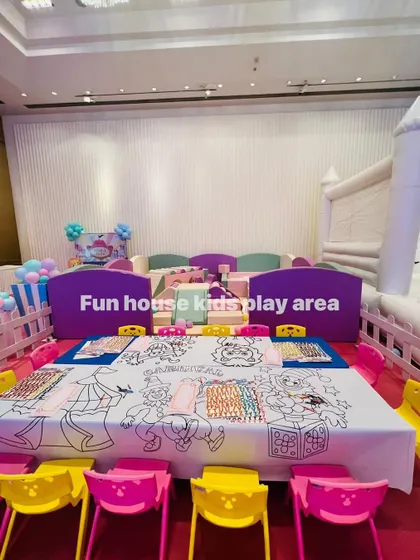We offer colorful table and chair setups, complete with coloring-sheet tablecloths to keep the kids engaged.
