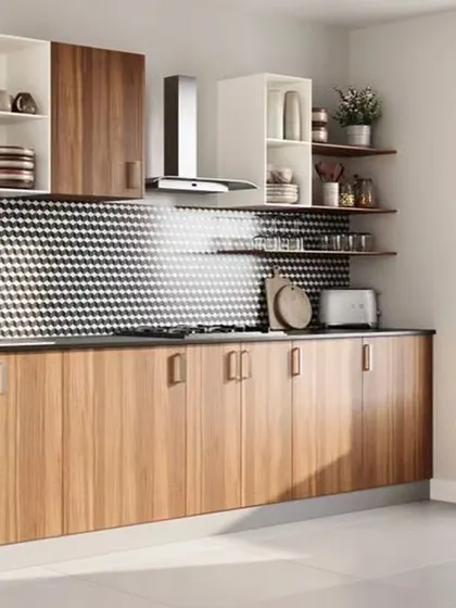 A straight-line kitchen design with a striking geometric-patterned backsplash. The warm wood cabinets and open shelving create a modern yet slightly retro vibe, perfect for an open-plan living area.