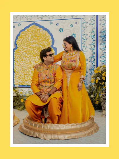 A sweet, candid moment between the couple during their Haldi. Paromita looks lovingly at Abhinav, her sunglasses adding a cool, modern twist to her traditional attire.