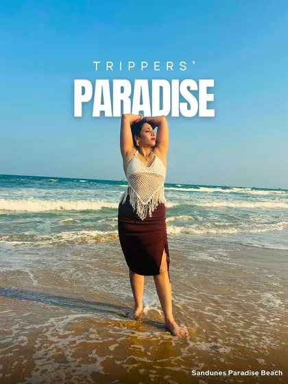 A traveler enjoying her paradise at Sandunes Paradise Beach in Pondicherry. Our trips are all about finding those perfect spots to relax and be yourself.
