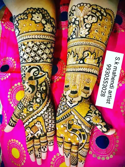 A vibrant and colorful design with a mix of traditional motifs. It features peacocks, swans, and geometric patterns in a bright yellow and black combination.