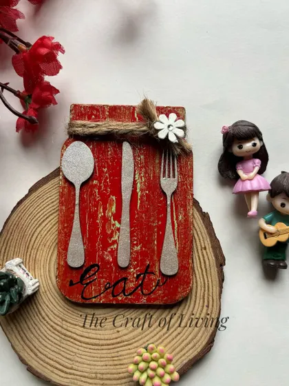 A matching jar-shaped wooden magnet with an "Eat" theme, perfect for a kitchen decor set.
