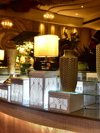 Another view of the decor for our handmade pasta station. The warm lighting and art-deco-inspired elements create a stylish and inviting corner for guests to enjoy fresh pasta.