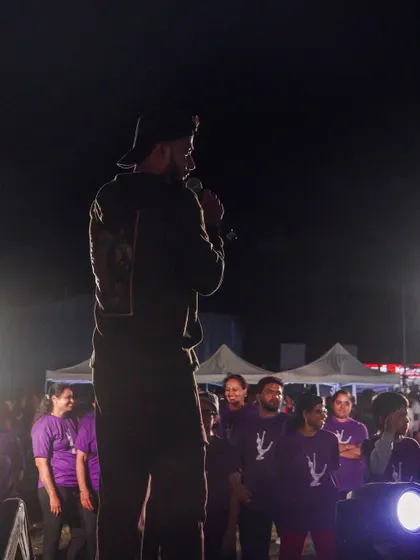 A silhouette of me on stage, addressing the large crowd at the Fiesta Zumba event. The scale of these events is truly something to behold.