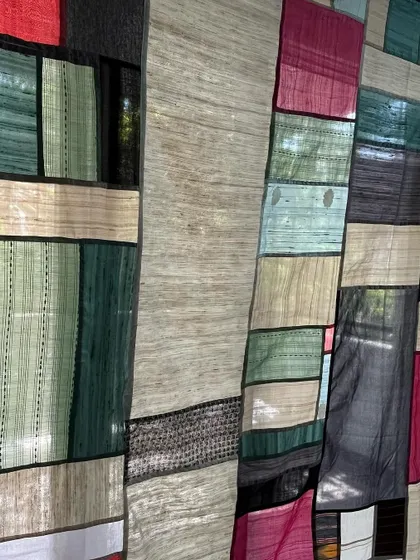 Another detail of the Pojagi divider, highlighting the texture of the different sarees used.