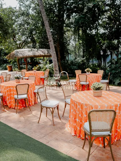 The same vibrant seating arrangement, showcasing how simple touches can create a festive and welcoming atmosphere for a pre-wedding event.