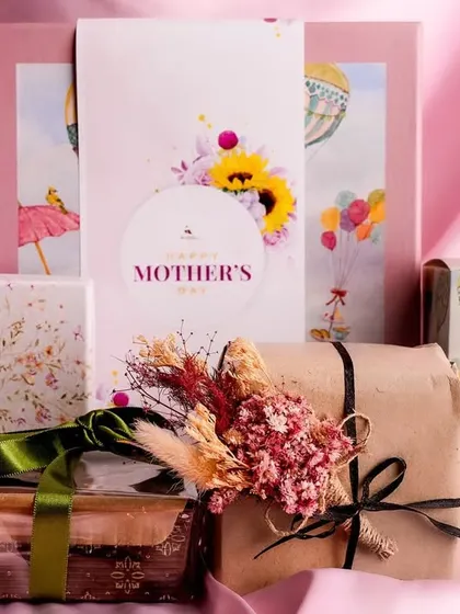 My Mother’s Day Gift Box is a delightful surprise. It includes a tea cake, a box of cookies, a box of lavender bon bons, and a charming jewelry box for her to keep.