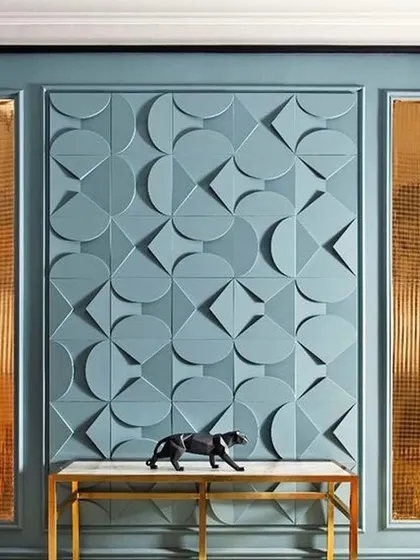 A duplicate of image 99, showing a geometric 3D wall panel that adds a modern, artistic touch to an entryway or feature wall.