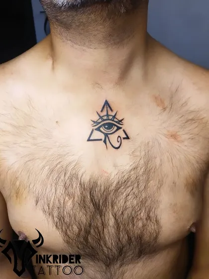 This Eye of Providence tattoo on the chest is a powerful symbol of guidance and divine watchfulness. The clean, bold lines create a striking and iconic image.