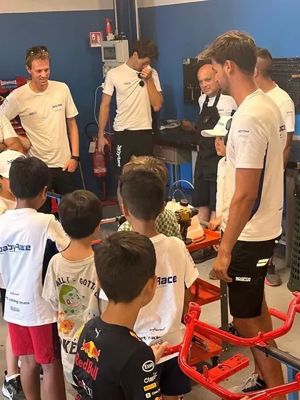 A hands-on learning session at the Baby Race Academy in Italy, where our drivers got to see the inner workings of a professional European karting team's workshop.