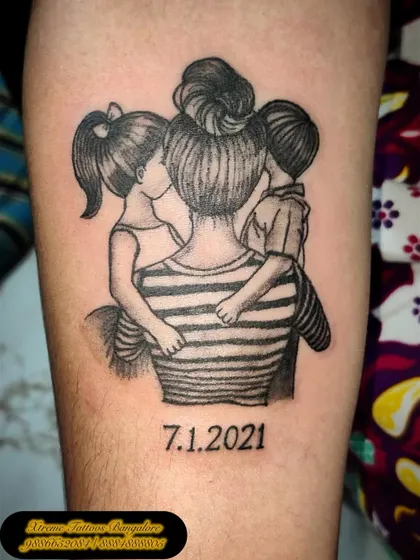 Here is another beautiful piece celebrating a mother's love, showing her embracing her two children. We also included a special date to make it even more personal.