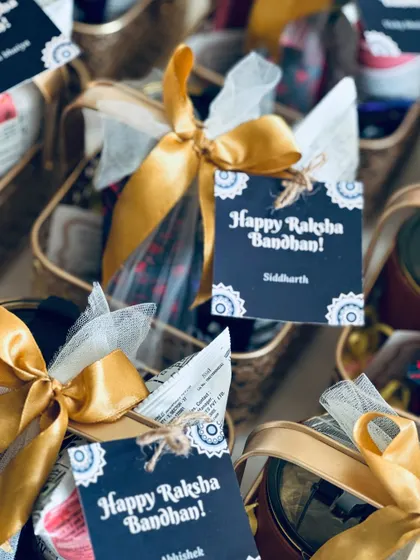 A detailed shot of the personalized "Happy Raksha Bandhan" tag, showing how we add a personal touch to every festive gift.