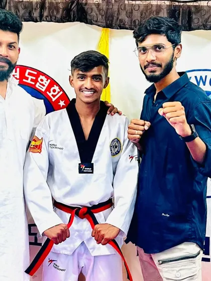 This student has earned his red and black belt.