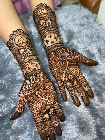 Another view of the engagement mehendi with personalized initials. The design is a perfect blend of modern personalization and traditional Indian henna art.