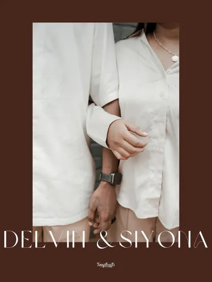 A close-up shot focusing on the couple's intertwined hands, a simple yet powerful symbol of their bond, perfect for a save-the-date announcement.