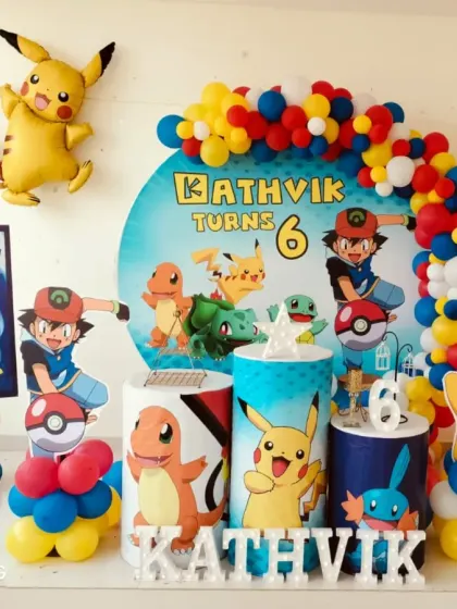 Gotta catch 'em all! We created this action-packed Pokémon theme for Kathvik's 6th birthday. The setup includes a character backdrop, balloon columns in red, yellow, and blue, and cutouts of Pikachu, Charmander, and other favorites.