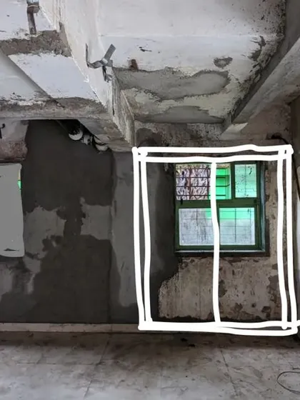 An early site photo with a sketch, marking out a potential window placement.