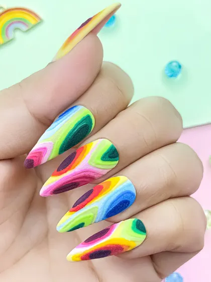 A bold and colorful abstract design created with acrylic powders. The layered colors create a topographical map effect, showcasing advanced acrylic techniques.