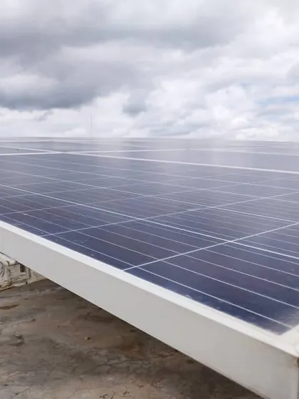 Solar panels are highly effective even on rainy or overcast days. This close-up shot shows our durable panels ready to capture every bit of available light to power your home.
