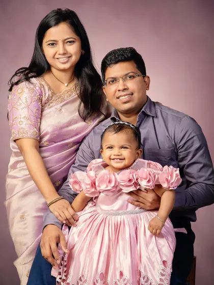A family is a story, and I am here to capture its most beautiful chapters. This classic family portrait shows the warmth and connection that I strive to bring out in every session, creating a legacy piece for your home.