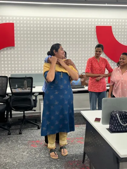 A participant learns how to break free from a chokehold during our women's self-defense seminar.