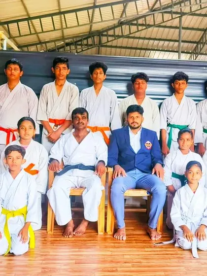 A group photo after a successful grading examination. Each new belt earned is a milestone in a student's journey of self-improvement.