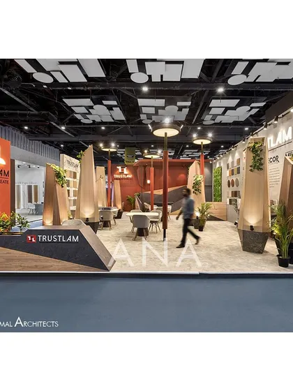 The Trustlam '23 exhibition space was conceptualized around the idea of a 'Flame of Trust'. We designed abstract lamp-like structures that served as both architectural elements and product displays, creating an open, sculptural field.