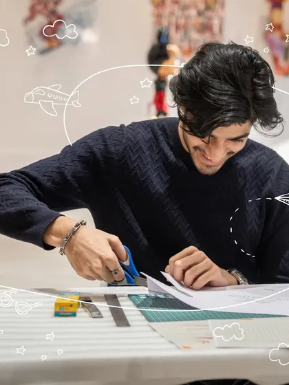 Precision is key in aeromodelling. This shot shows a participant meticulously cutting out the templates for his glider. I ensure everyone learns the right techniques to create a perfectly balanced and airworthy model.