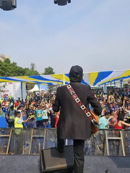 The view from behind our guitarist, looking out at the sea of people at the TCS World 10K. It's an amazing feeling to play for such a large and energetic audience.
