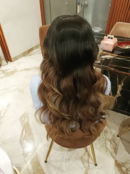 Beautiful ombre hair styled into loose, beachy waves. This shows how I work with colored hair to enhance its dimension and texture.