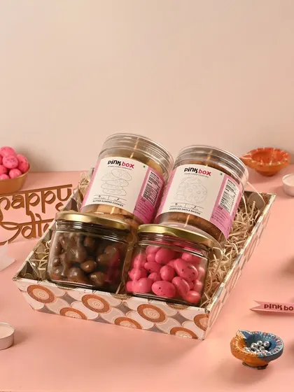 Our 'Utsav' hamper is a celebration in a box. It combines two types of our popular cookies with jars of rose-flavored almond dragees and milk chocolate-coated cashews.