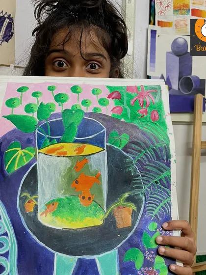 Inspired by the work of Henri Rousseau, this student created a lush jungle scene with a fishbowl at its center. This project teaches composition and how to create a sense of depth and wonder.